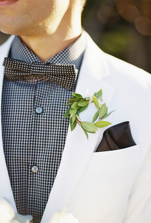 White grooms suit with black and white checkered shirt and bow tie  White grooms suit with black and white checkered shirt and bow tie