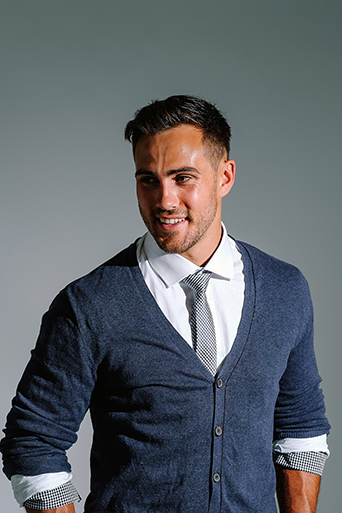 business casual cardigan over a collared shirt and polka dot tie business casual cardigan over a collared shirt and polka dot tie