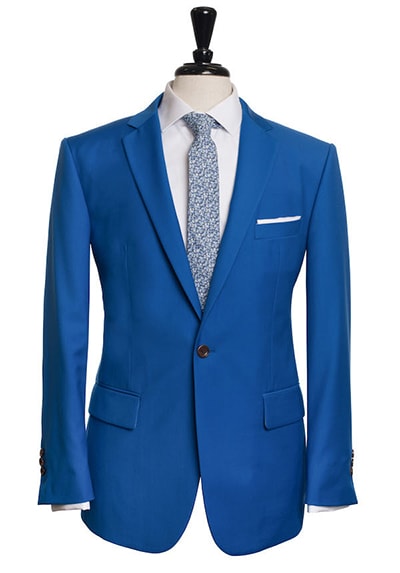 bright electric blue suit with blue floral tie and flap pockets